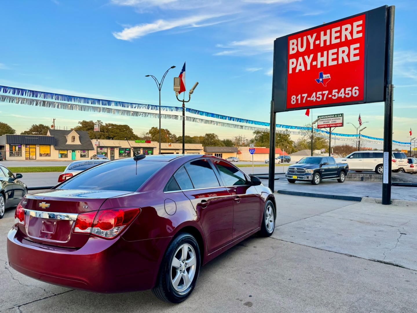 2016 RED /Gray CHEVROLET CRUZE LIMITED 1LT 1LT Auto 4dr Sedan w/1SD (1G1PE5SB1G7) with an 1.4L I4 Turbocharger engine, Automatic 6-Speed transmission, located at 5900 E. Lancaster Ave., Fort Worth, TX, 76112, (817) 457-5456, 0.000000, 0.000000 - This is a 2016 Chevrolet Cruze Limited 1LT Auto 4dr Sedan w/1SD that is in excellent condition. There are no dents or scratches. The interior is clean with no rips or tears or stains. All power windows, door locks and seats. Ice cold AC for those hot Texas summer days. It is equipped with a CD playe - Photo#6